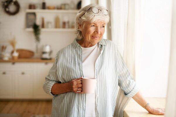 portrait-stylish-gray-haired-woman-with-round-spectacles-her-head-enjoying-morning-coffee-m portrait-stylish-gray-haired-woman-with-round-spectacles-her-head-enjoying-morning-coffee-m